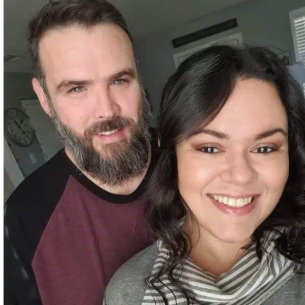 Dennis and Becca, creators of Unsent Letters Wall