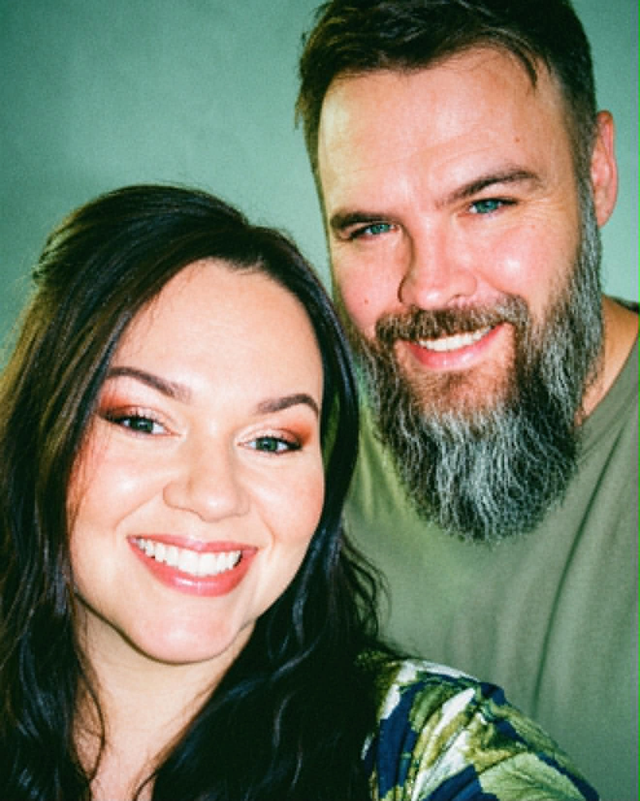 Dennis and Becca, the husband-and-wife founders of Unsent Letters Wall
